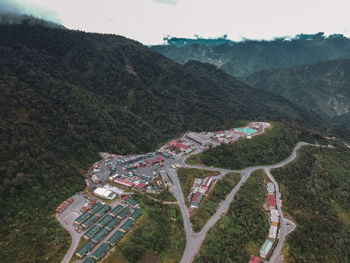 High angle view of plants and mountains against sky