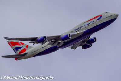 Low angle view of airplane against clear sky