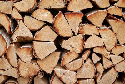 Full frame shot of logs in forest