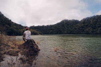 Full length of man on mountain against sky