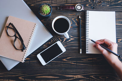 High angle view of coffee cup on table