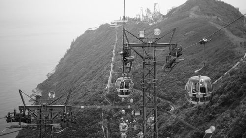 High angle view of overhead cable car at sea