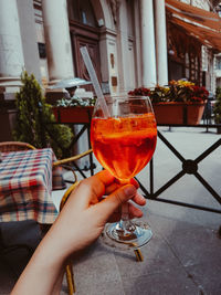 Close-up of hand holding drink