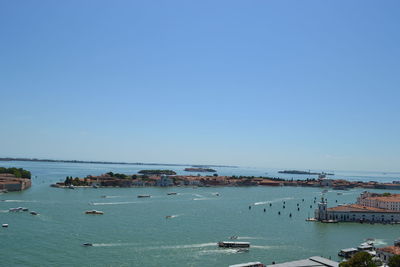 Scenic view of sea against clear blue sky