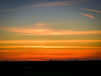 Scenic view of dramatic sky during sunset