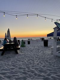 Scenic view of sea against clear sky during sunset