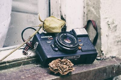 Close-up of camera on table