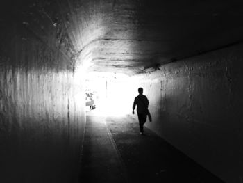 Full length of woman in tunnel