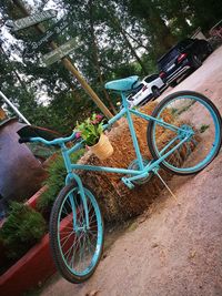 High angle view of bicycle parked on footpath