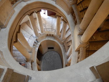 Low angle view of spiral staircase in building