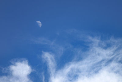 Low angle view of moon in sky