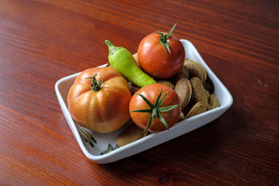 High angle view of fruits in bowl on table