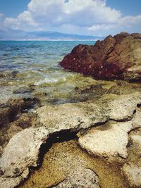 Scenic view of sea shore against sky