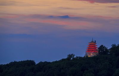 Building against sky during sunset