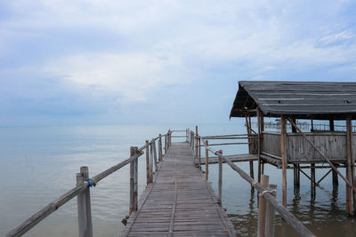 Bamboo bridge with huts to rest and enjoy the beauty of the north coast of karawang, indonesia