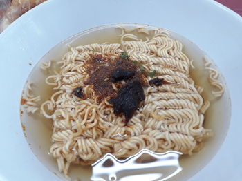 High angle view of pasta in bowl on table