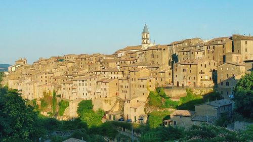 View of buildings against clear sky