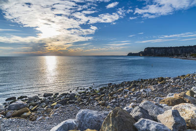 Winter sunset over the bay of portopiccolo sistiana. duino. italy