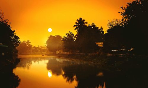 Scenic view of lighthouse at sunset