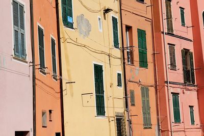 Low angle view of residential buildings by street