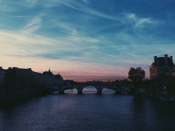 Bridge over river against sky