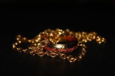 Close-up of ring over black background