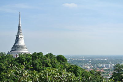 View of buildings in city against sky