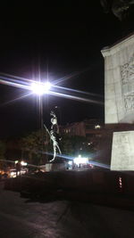 View of illuminated street at night