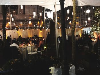 Group of people in restaurant at night