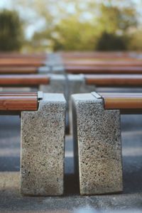 Close-up of metallic railing on table