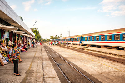 Train on railroad station platform against sky