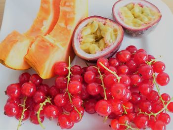 High angle view of strawberries in plate on table