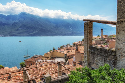 Limone del castel in lake garda italy. with lemon trees growing in the castle garden and the town vi