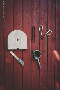 Tools hanging on wooden wall