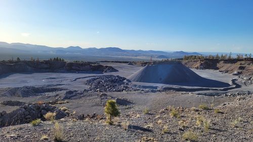 Aerial view of volcanic landscape against sky