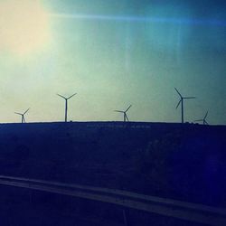 Wind turbines on field