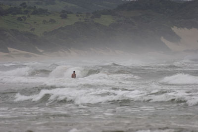 Person swimming in sea