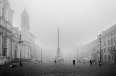 People walking on street early morning