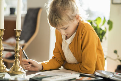 Girl doing homework at home