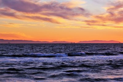 View of calm sea at sunset