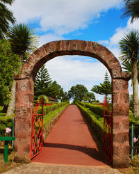 Arch bridge against sky