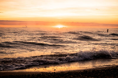 Scenic view of sea against sky during sunset