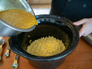 High angle view of person preparing food