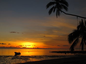 Scenic view of sunset over sea