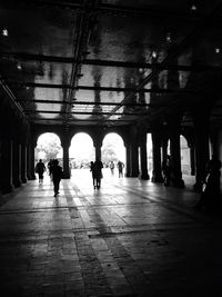 People walking in corridor