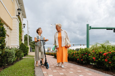 Portrait of happy senior women and granddaughter.