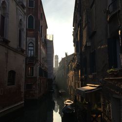 Narrow street amidst buildings in town