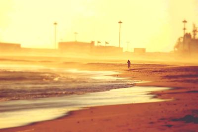 Silhouette of people at sunset