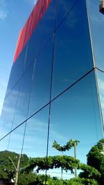 Low angle view of building against blue sky