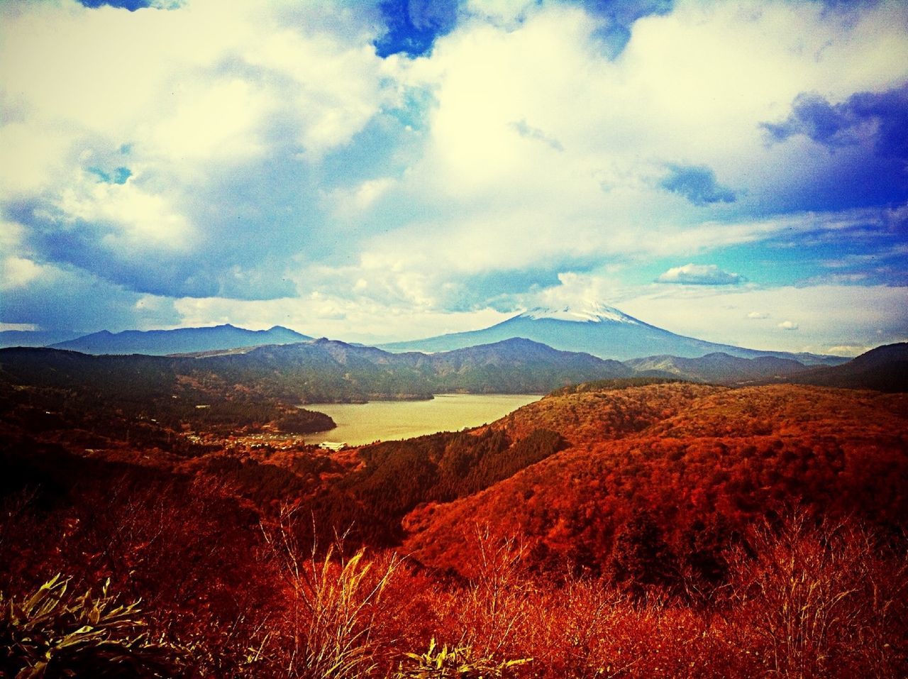 mountain, landscape, tranquil scene, tranquility, scenics, sky, mountain range, beauty in nature, nature, cloud - sky, non-urban scene, cloud, field, horizon over land, remote, idyllic, blue, grass, countryside, plant